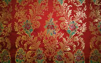 Broccato Misto Seta, con ricamo in filo di  metallo. Ramage fondo rosso