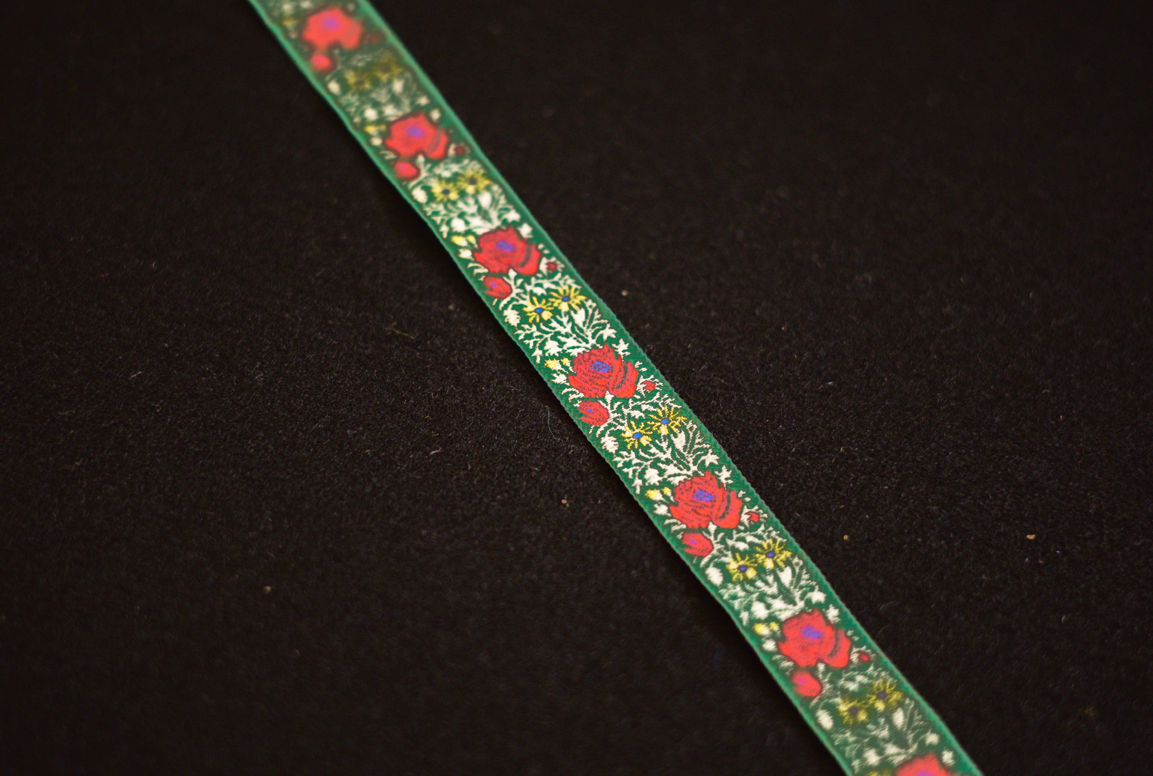 Passamaneria Broccato fondo verde (h.1.3cm)